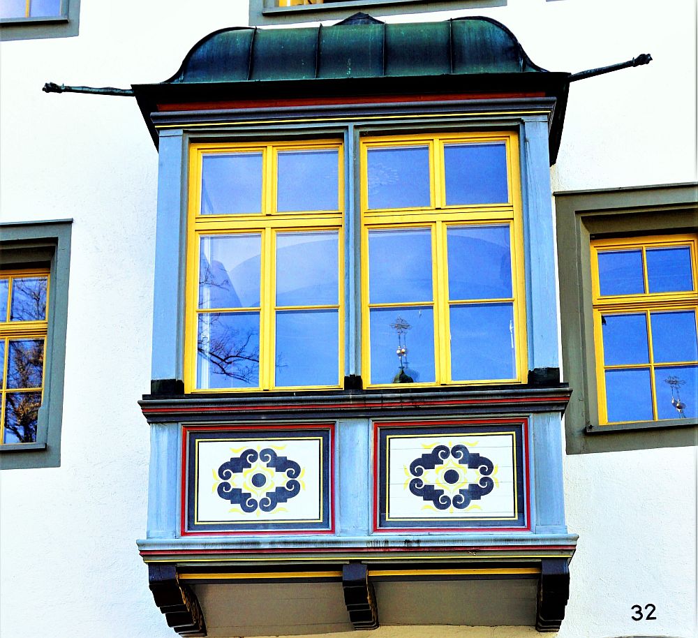 A decorative bay window painted brightly.