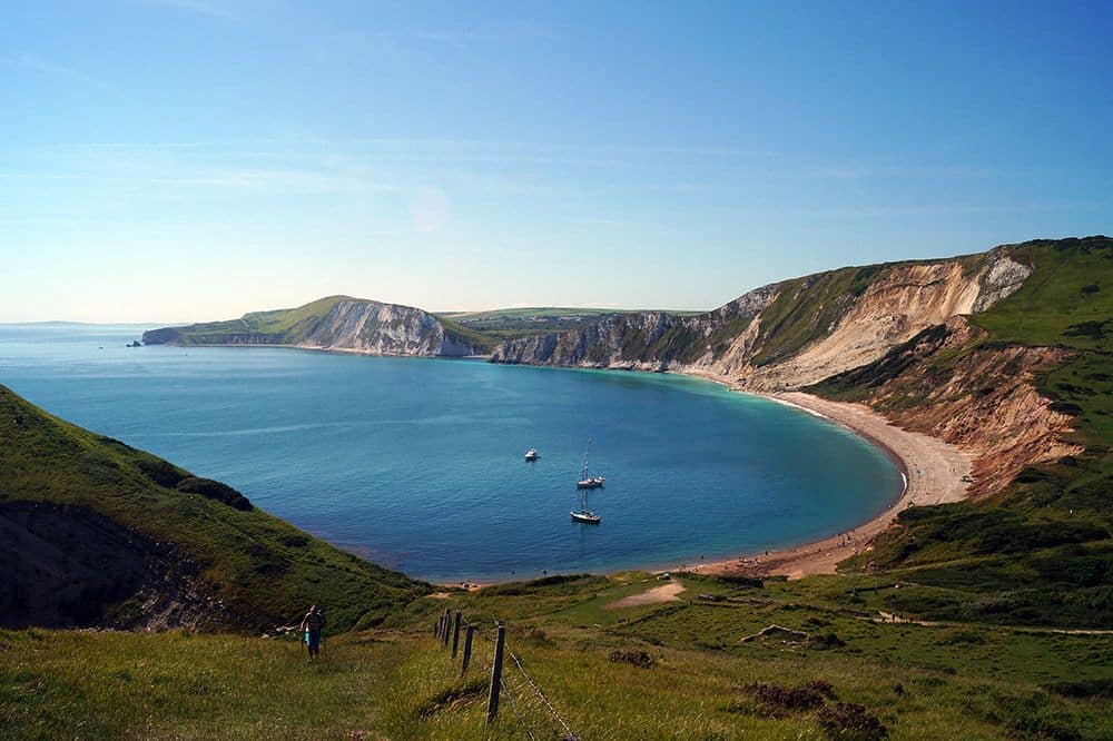 A bay of blue water at Dorset and East Devon coast.