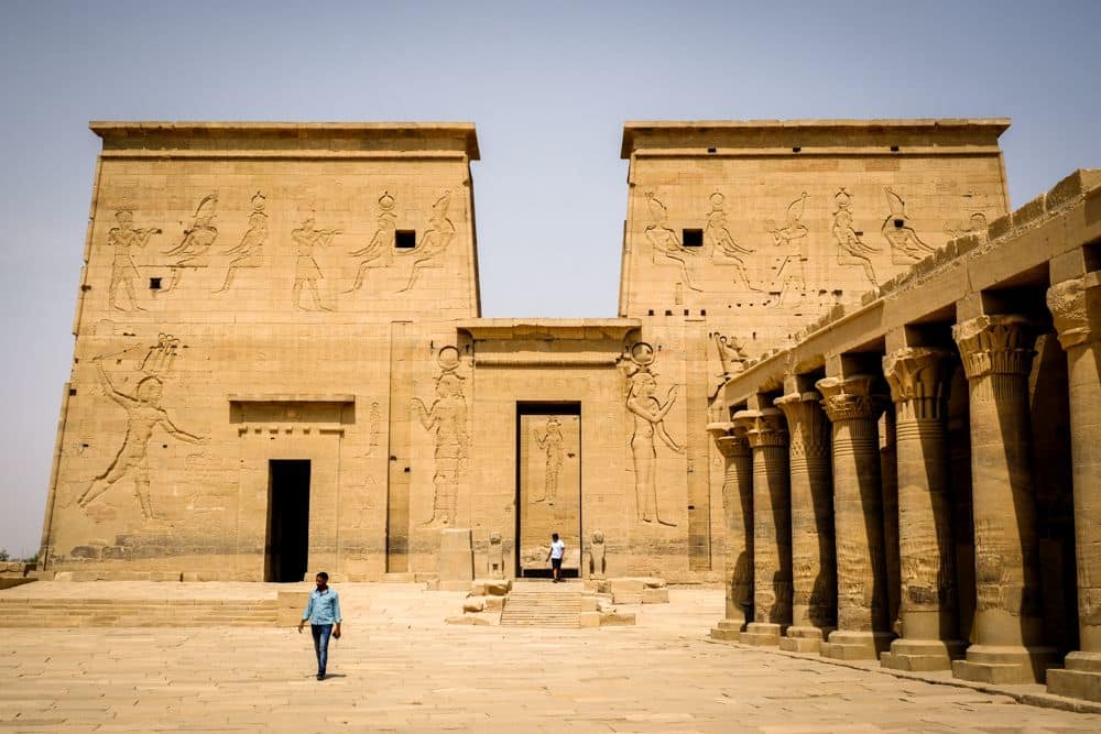 A stone building with two square parts connected by a large doorway at Philae Temple.