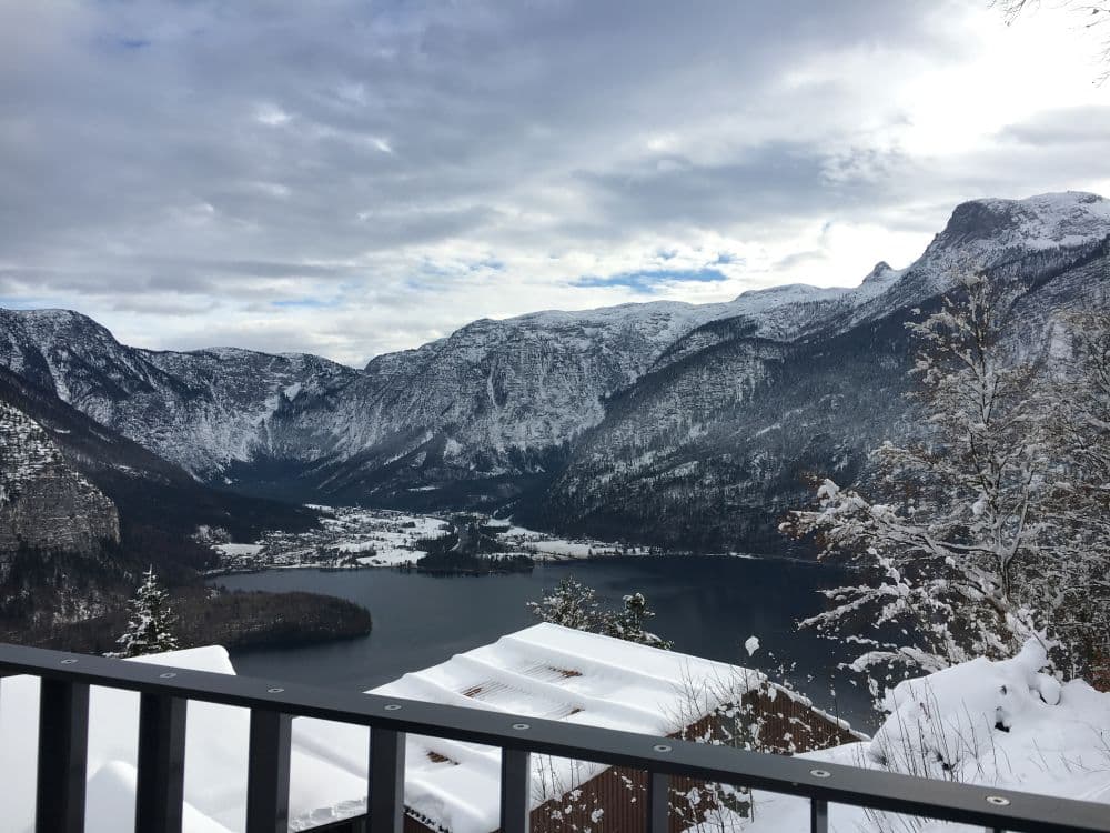 A view over Hallstatt lake after it has snowed on the mountains surrounding the lake.