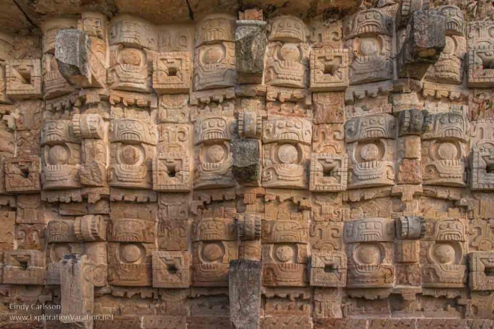 Interlocking stone blocks carved with square faces.