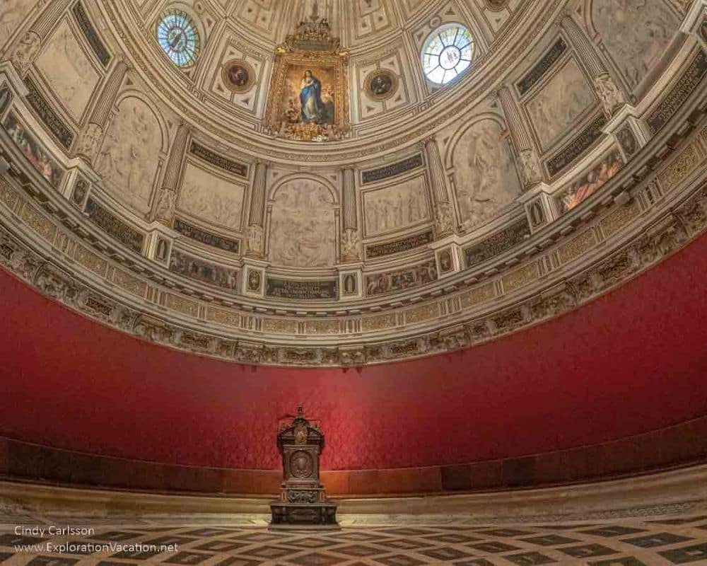 The far wall is curved and painted red. Above that, part of the dome is visible.