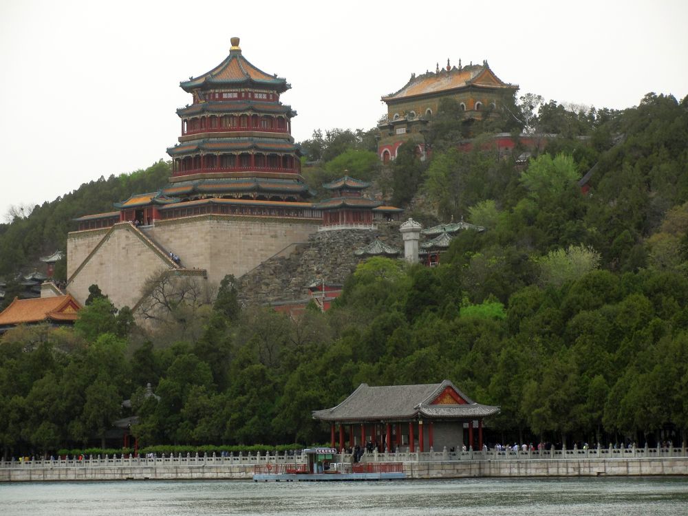 On a hill above the lake, a palace and a pagoda.