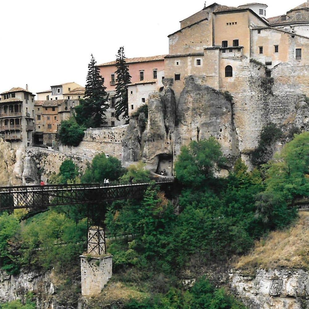 A jumble of buildings on the edge of a steep gorge.