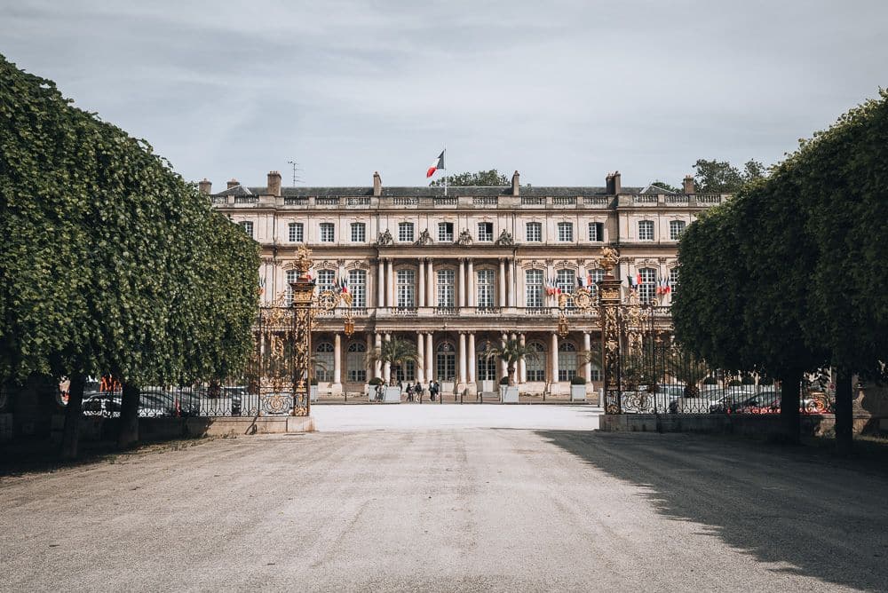 Seen across the square, a stately building - a palace - in an 18th-century baroque style.