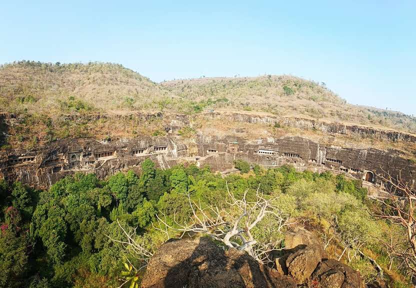 View from a distance on the whole cliff with its rows of caves.
