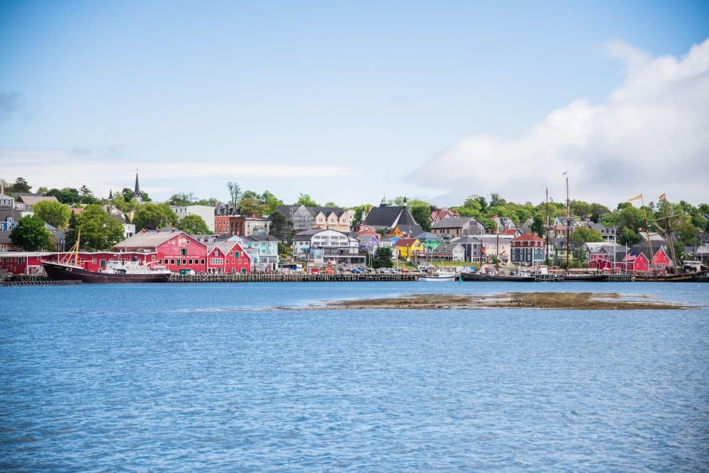 View of the colorful buildings of Old Town Lunenburg, seen across the water.