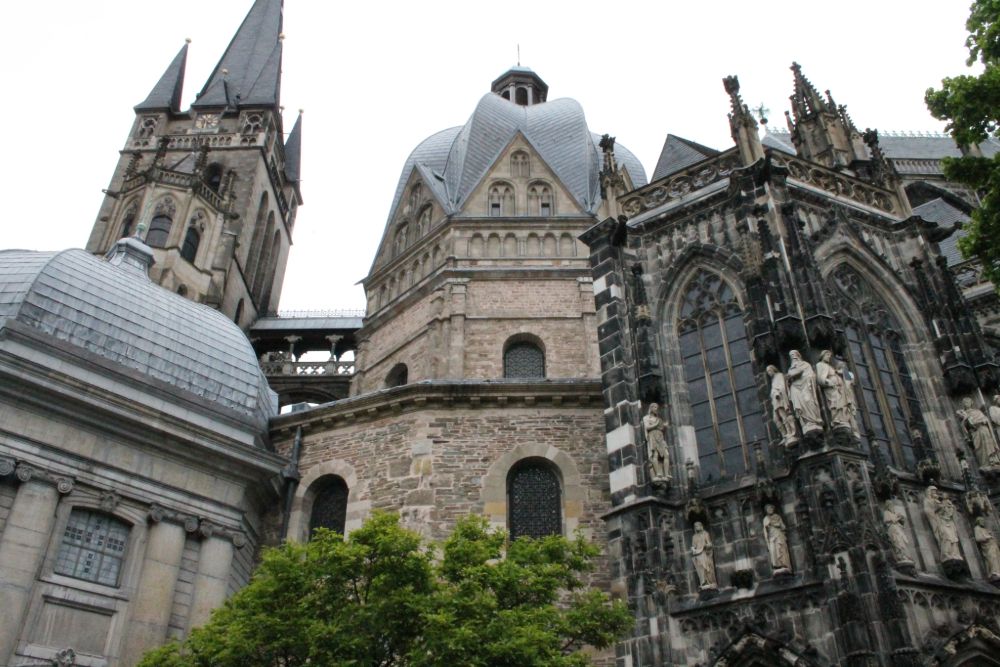 Looking up at the central dome and one spire of Aachen Cathedral.