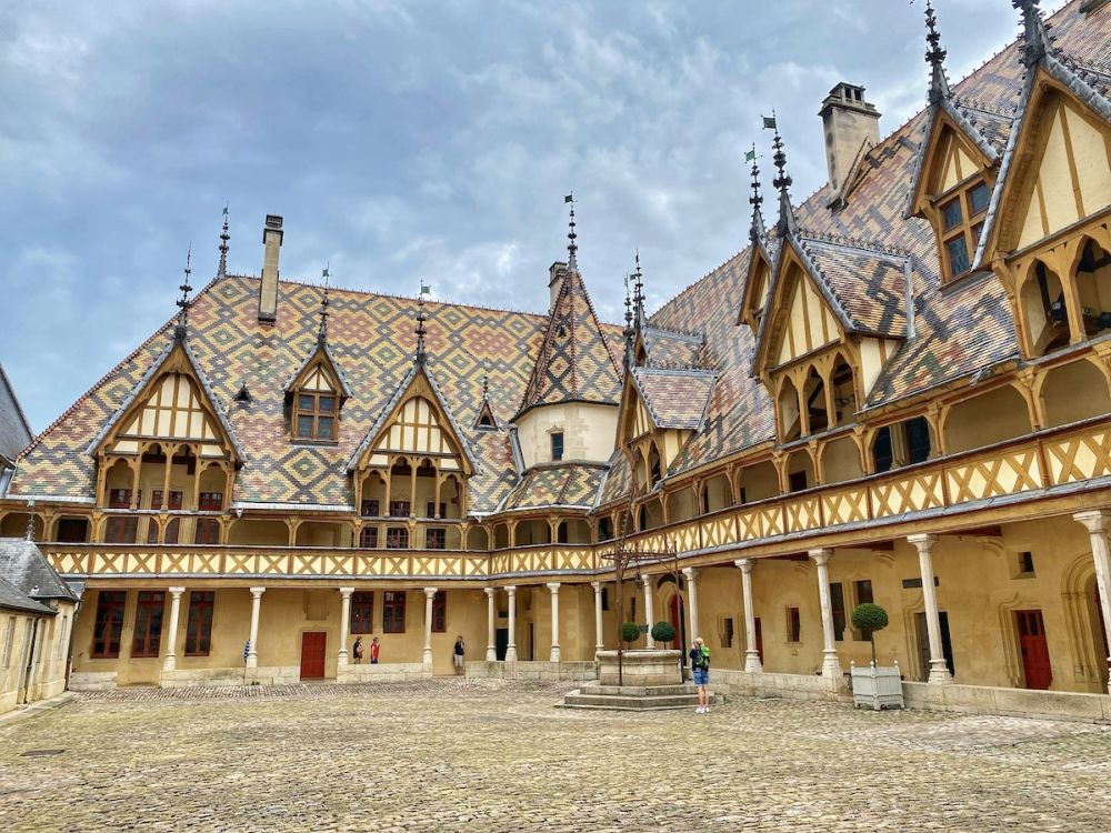 A beautiful building with a portico and turrets.