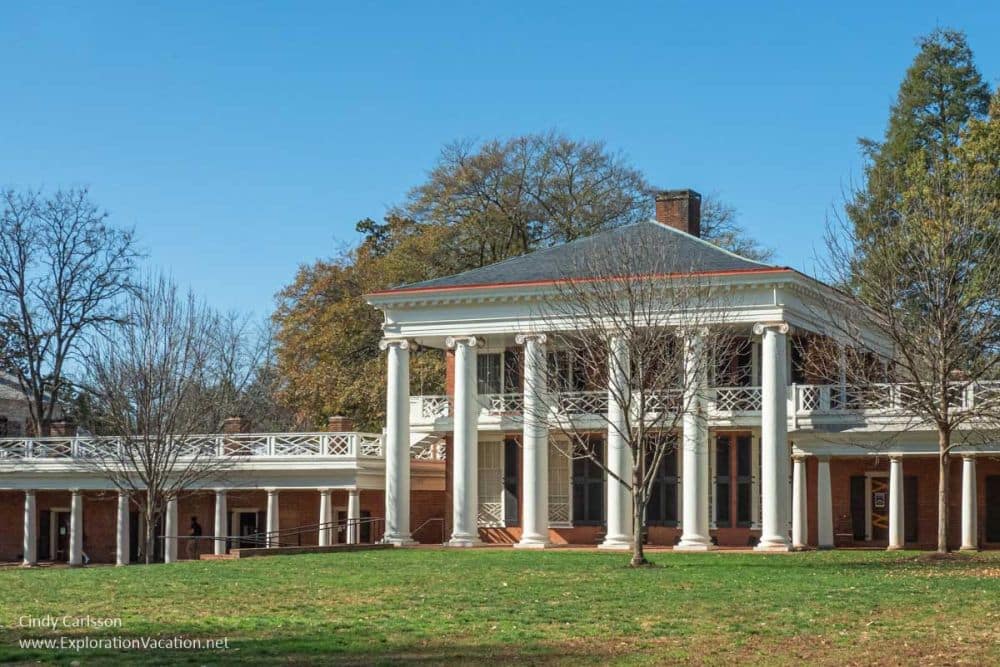 Neoclassical building with neat pillars along the front creating a portico.