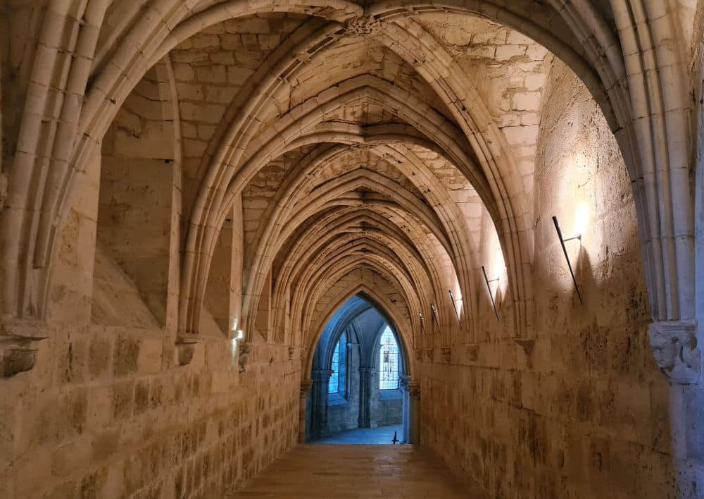 A gothic-arched hallway.