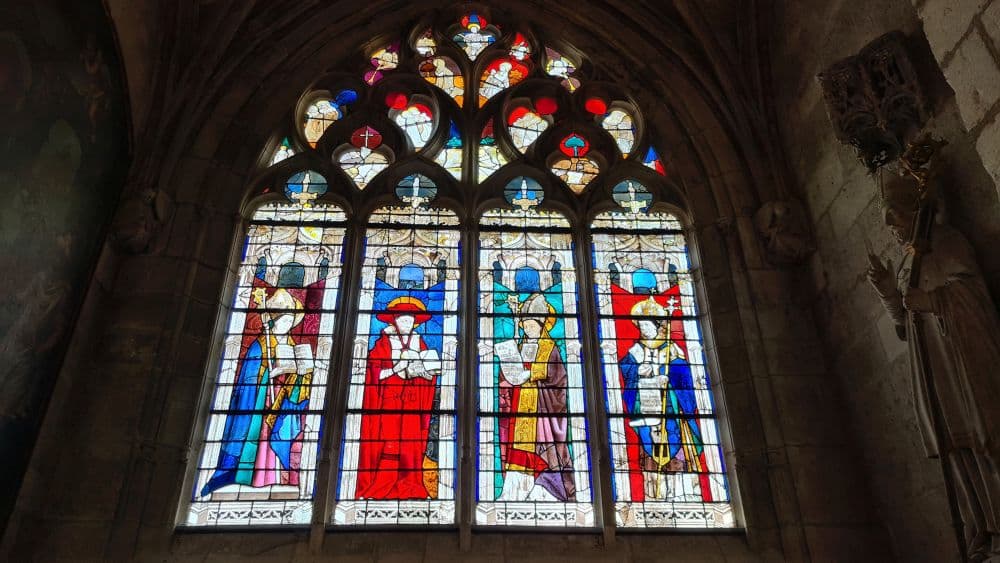 An ornate and colorful stained-glass window.