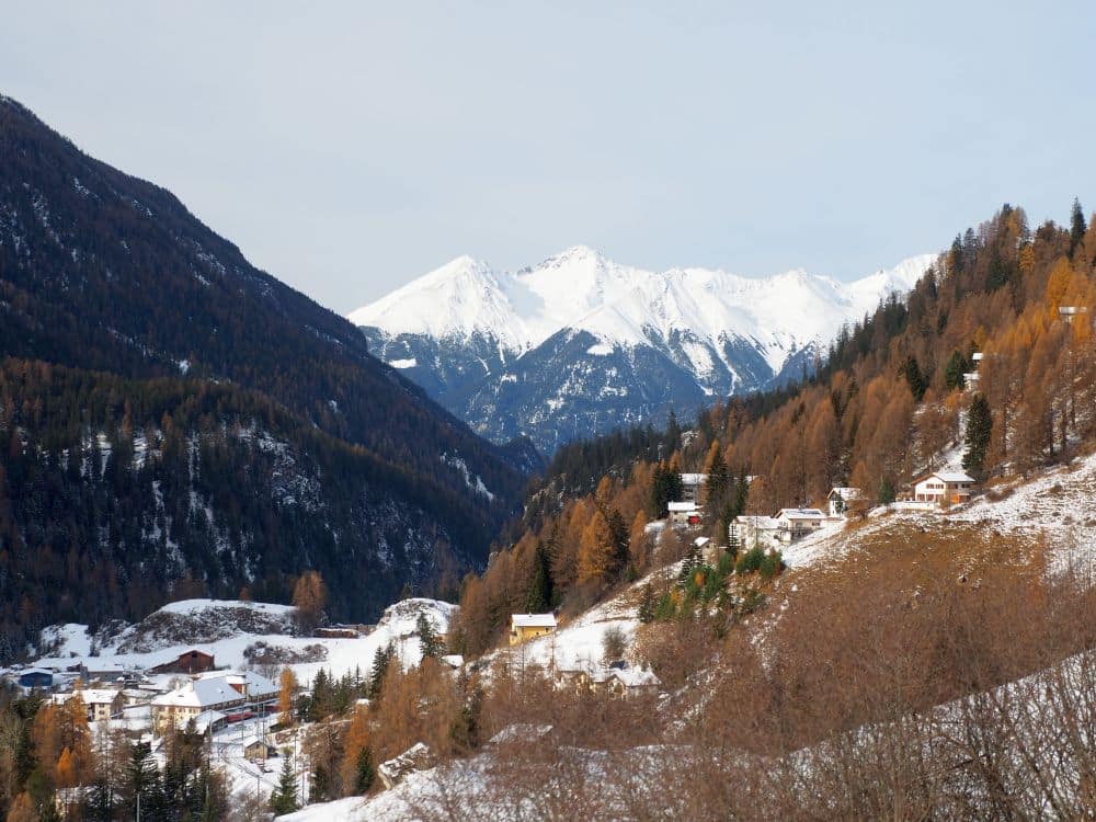 A view to snow-capped mountains in the distance.