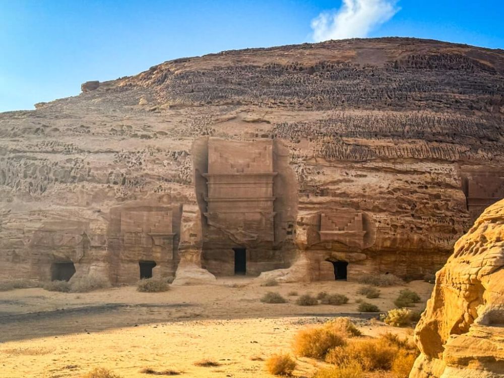 Tombs cut into the side of a cliff.