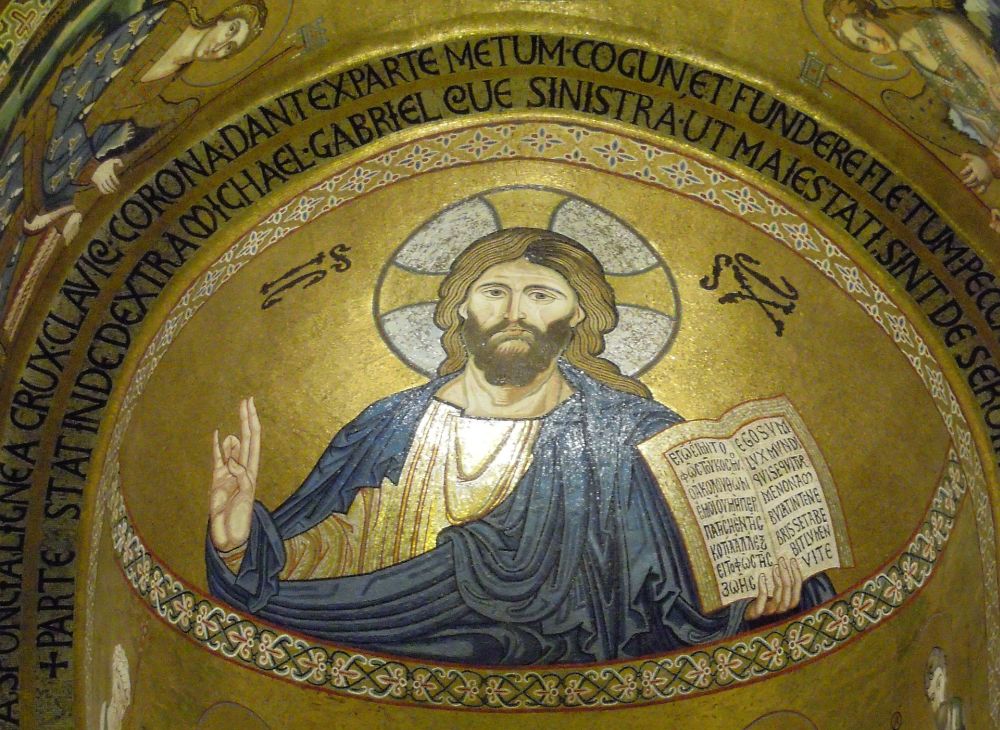 A gold mosaic with an image of Jesus.