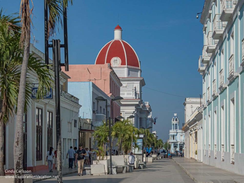 A pedestrian street with elegant buildings on both sides.