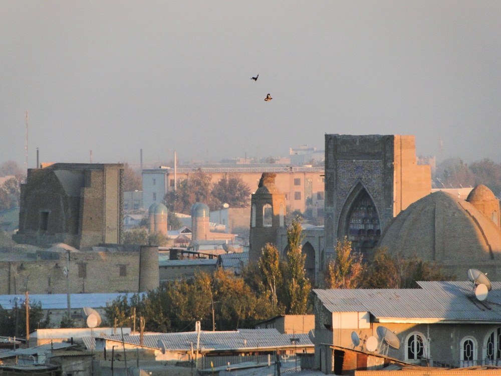 A view over the Historic Centre of Bukhara with several of the historical buildings visible.
