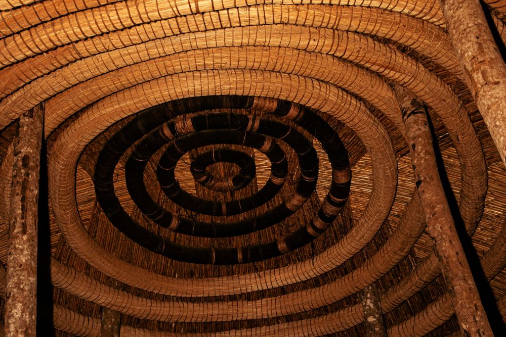 A section of the woven reed ceiling: concentric circles of reeds.