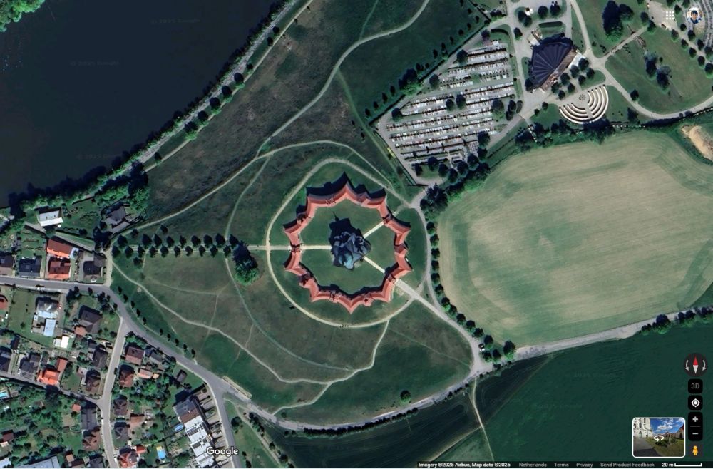 The church seems round from above, and the cloister around it is in the shape of a 10-pointed star.
