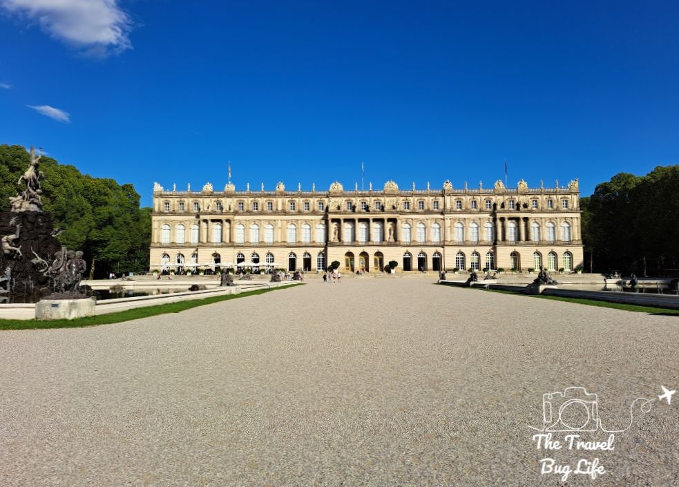 A view from a distance of the Palace: not many stories high, but extremely wide.