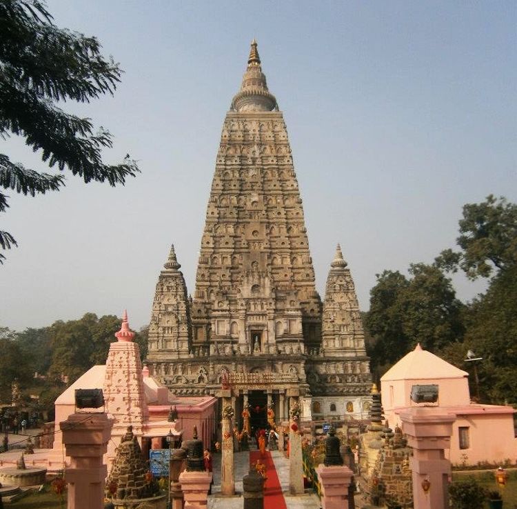 The main temple of Mahabodhi Temple Complex at Bodh Gaya is very tall and tapers to a point at the top. It is covered with carvings.