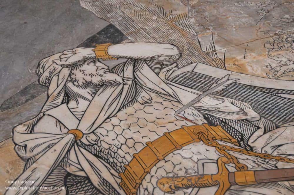 Marble image of a man in armor.