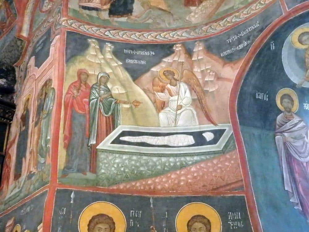 A fresco depicting women looking at a coffin, perhaps?