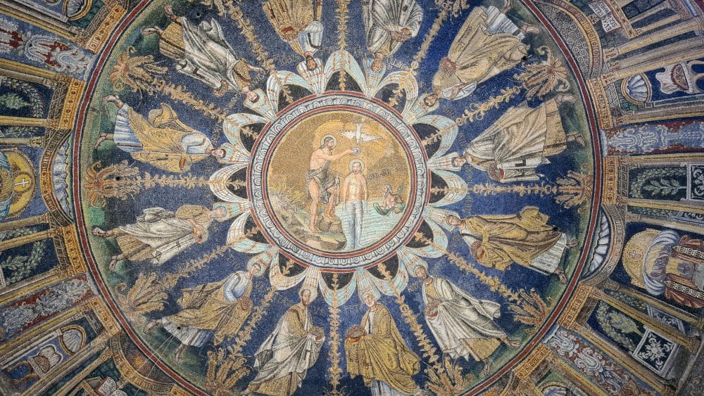 The baptism is in the center of the dome, and it is circled by images of the apostles.